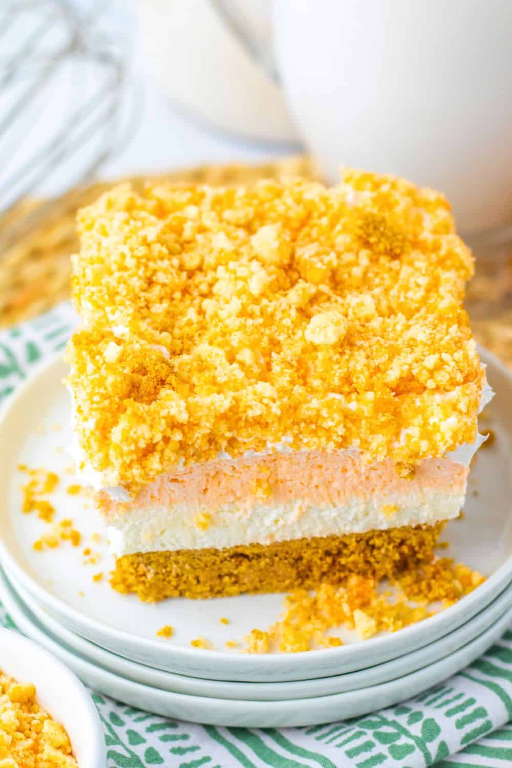 layered dessert bar with oreo crunch topping.