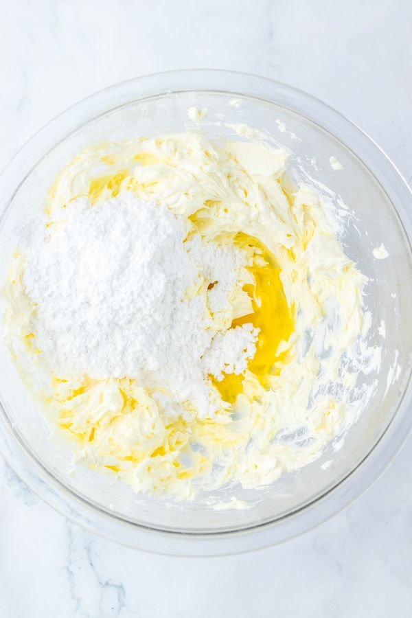 orange cream cheese mixture ingredients in bowl.