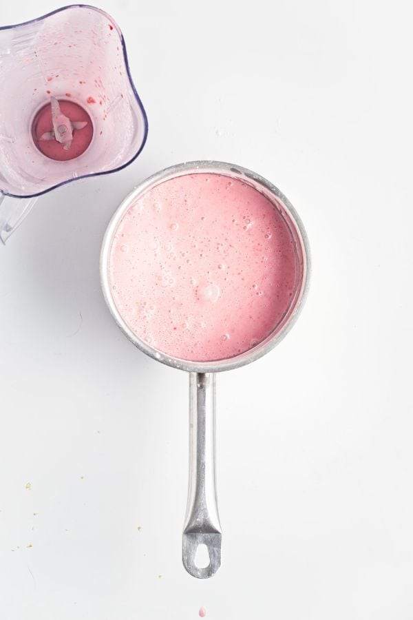 uncooked raspberry mixture in pan.