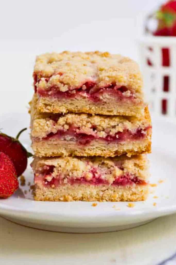 stack of strawberry crumble dessert bars.
