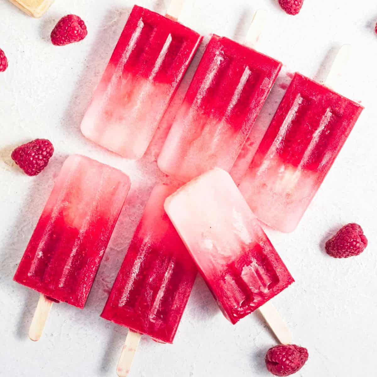 top view of raspberry popsicles.
