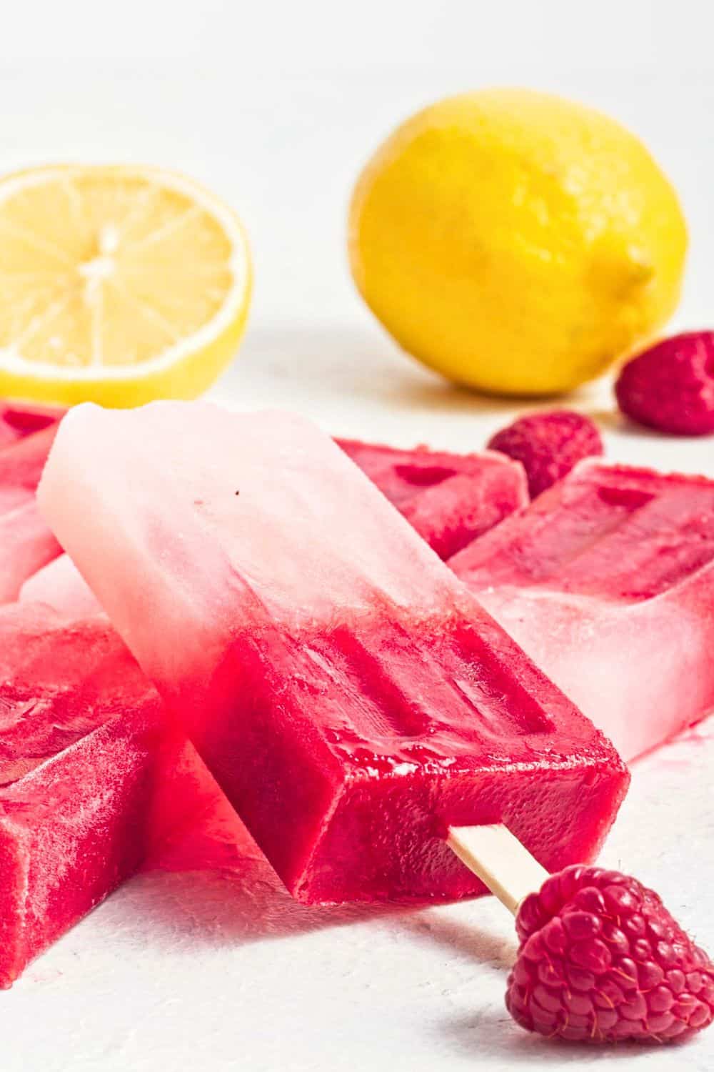 easy frozen fruit popsicles with raspberries.