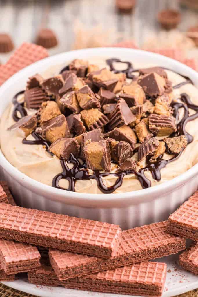 peanut butter cup dessert dip with wafers for dipping.