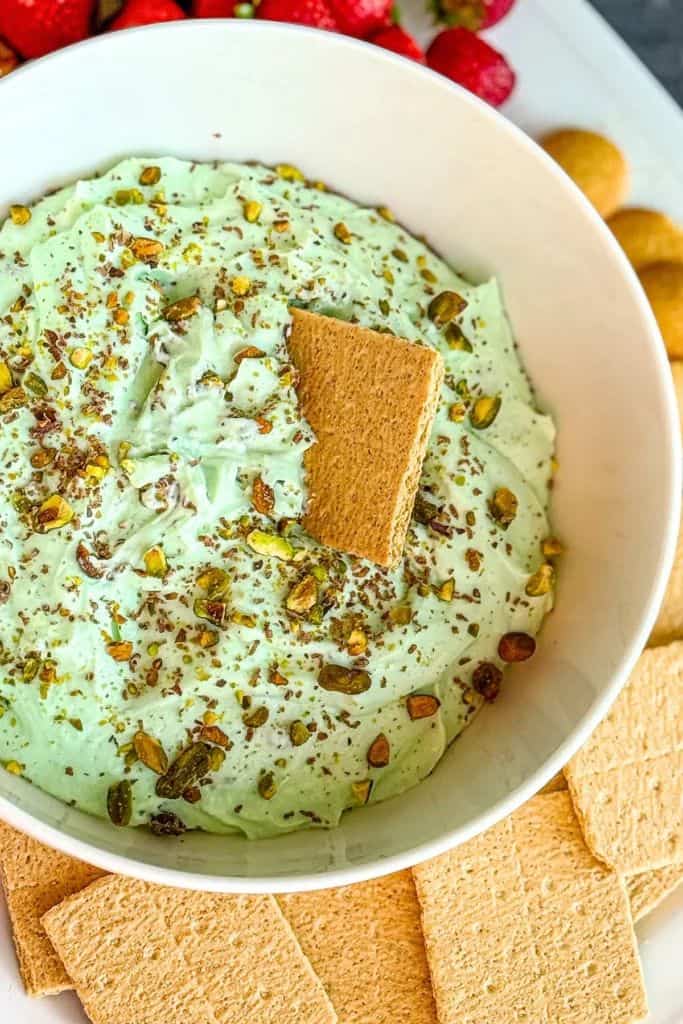 green pistachio dessert dip in bowl.