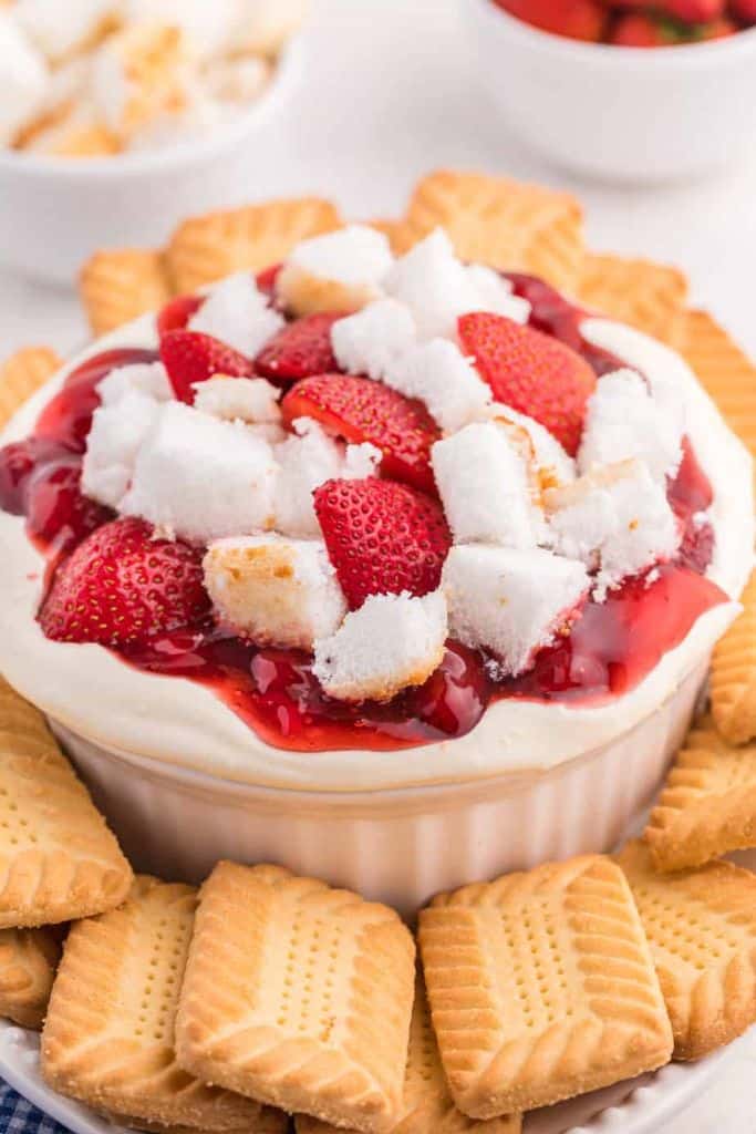 strawberry dip with angel food cake and berries.