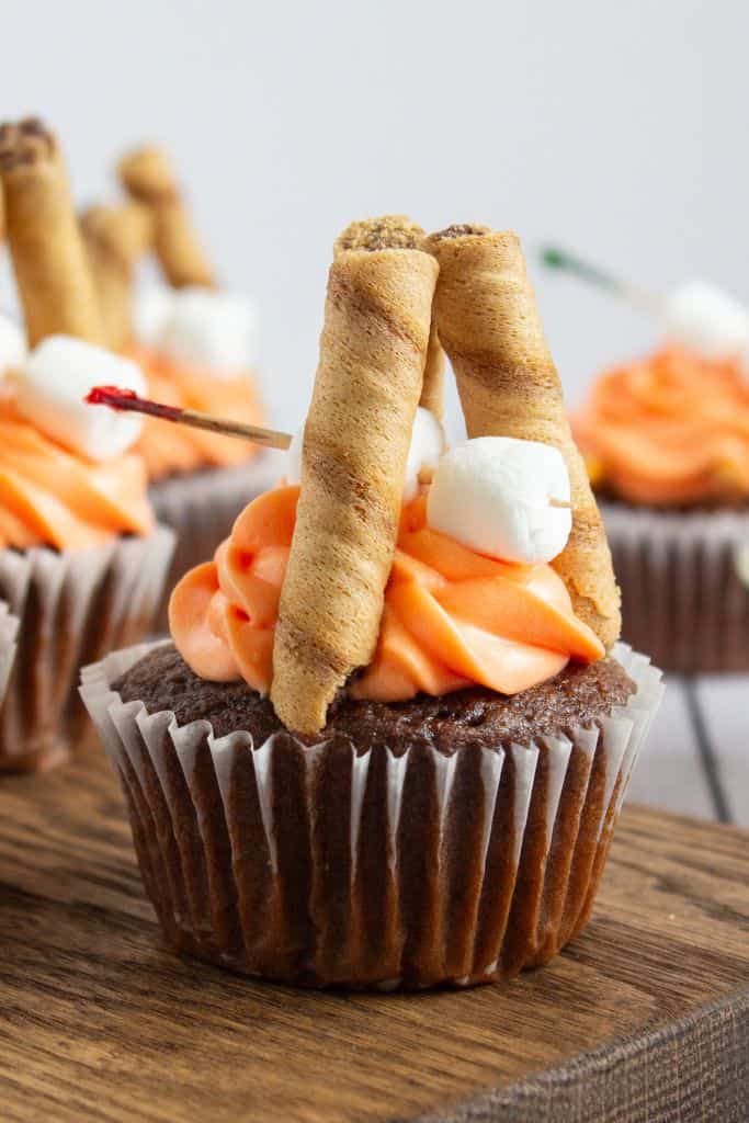campfire cupcakes with orange frosting.