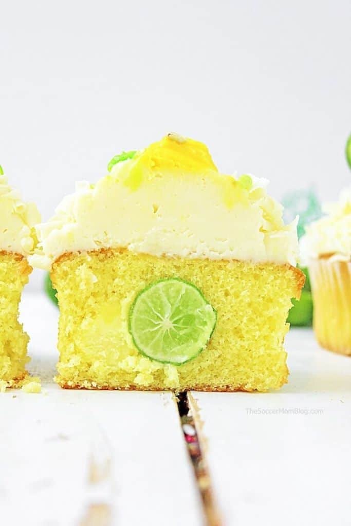 halved key lime cupcake with frosting.