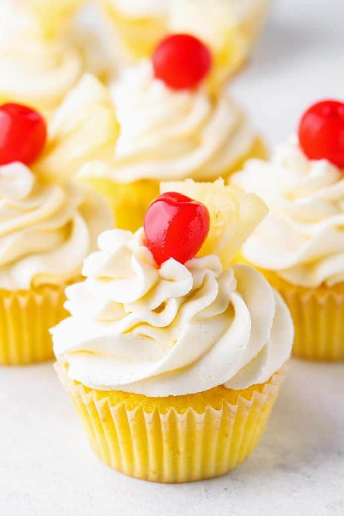 frosted tropical pineapple cupcakes.