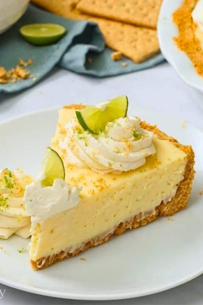 slice of key lime pie on plate.