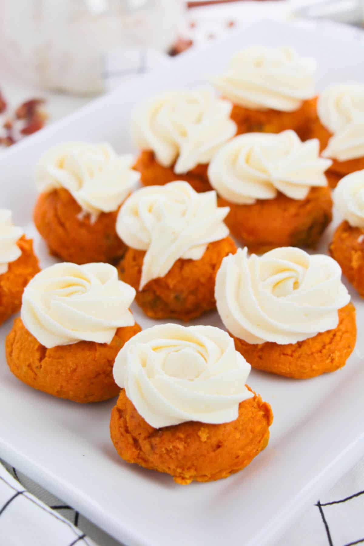platter of frosted pumpkin pecan cookies.