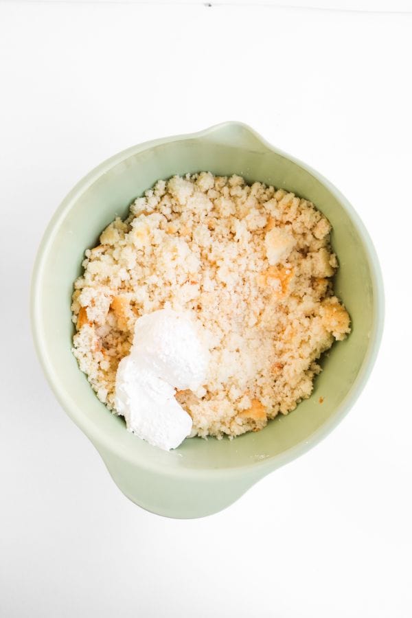 cake crumbs and marshmallow fluff in bowl.