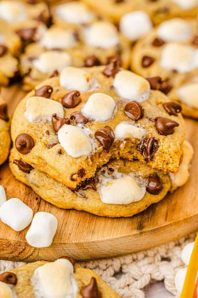 smores flavored cookie on wooden platter.