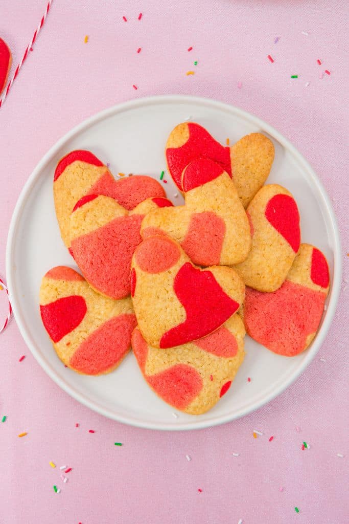 love heart shaped cookies on plate.