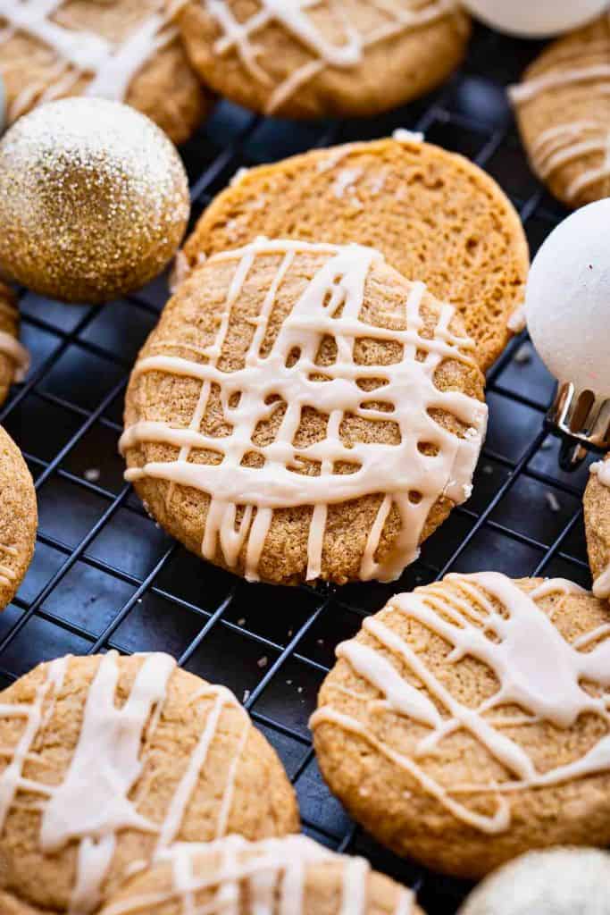 glazed maple cookies on wire rack.