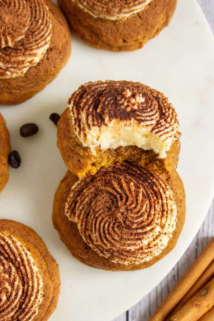 frosted pumpkin tiramisu cookies on platter.