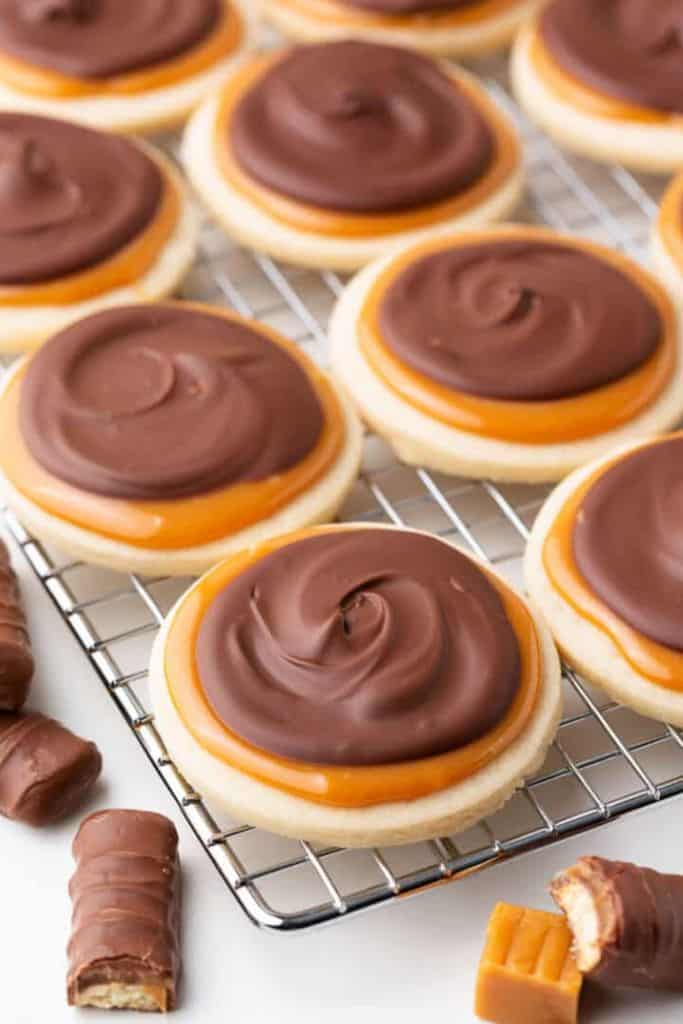 twix caramel and chocolate cookies on tray.