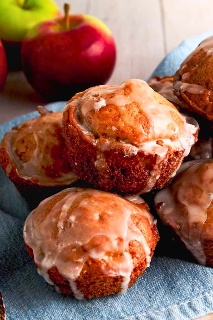 pile of glazed apple fritters.