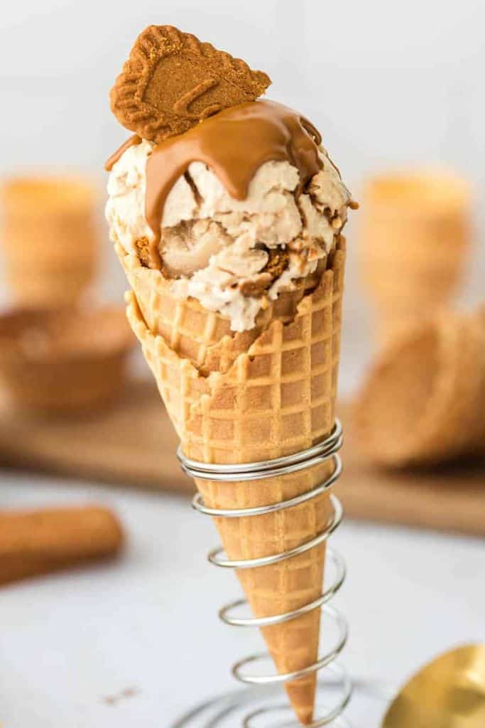 scoop of biscoff cookie butter ice cream in waffle cone.