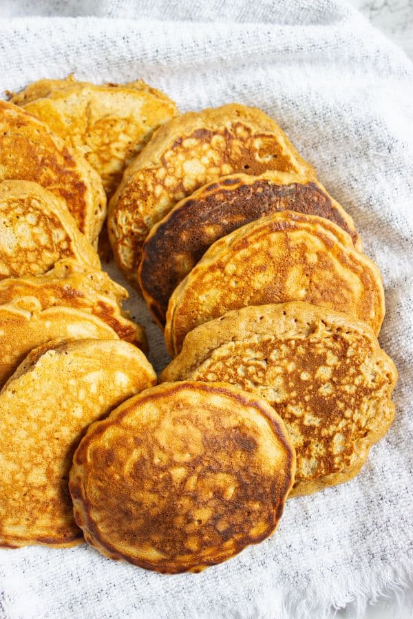 golden buttermilk pancakes in basket.