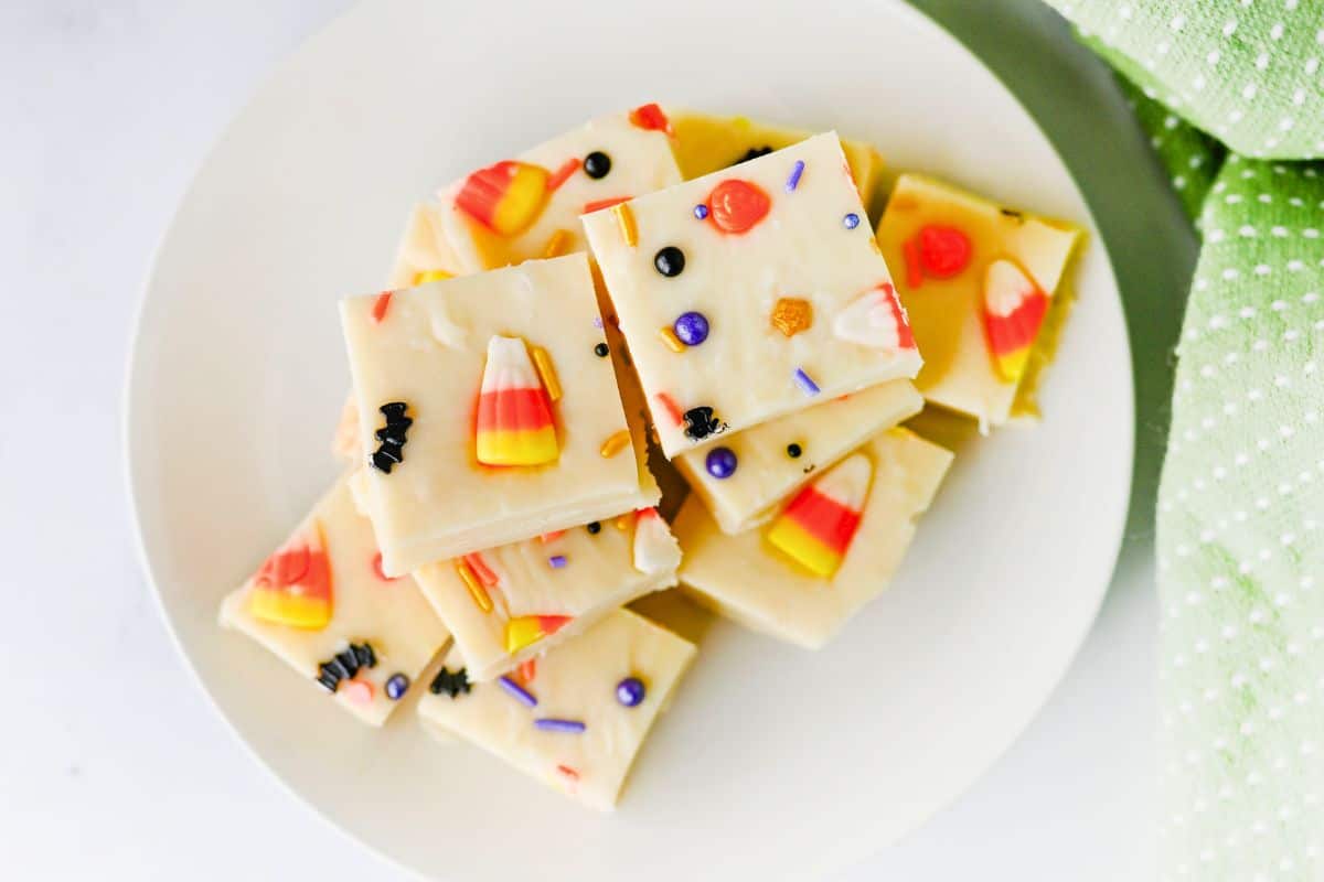 plate of halloween themed fudge with candy corn.