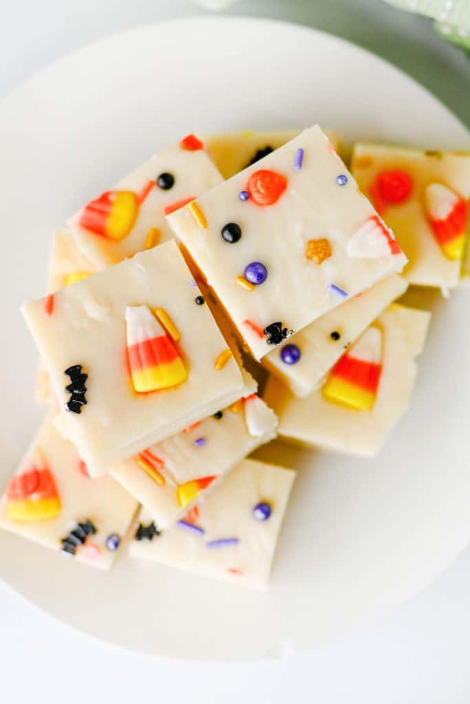 pieces of candy corn fudge on plate.