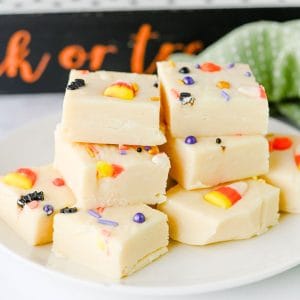 white fudge with condensed milk and Halloween sprinkles.