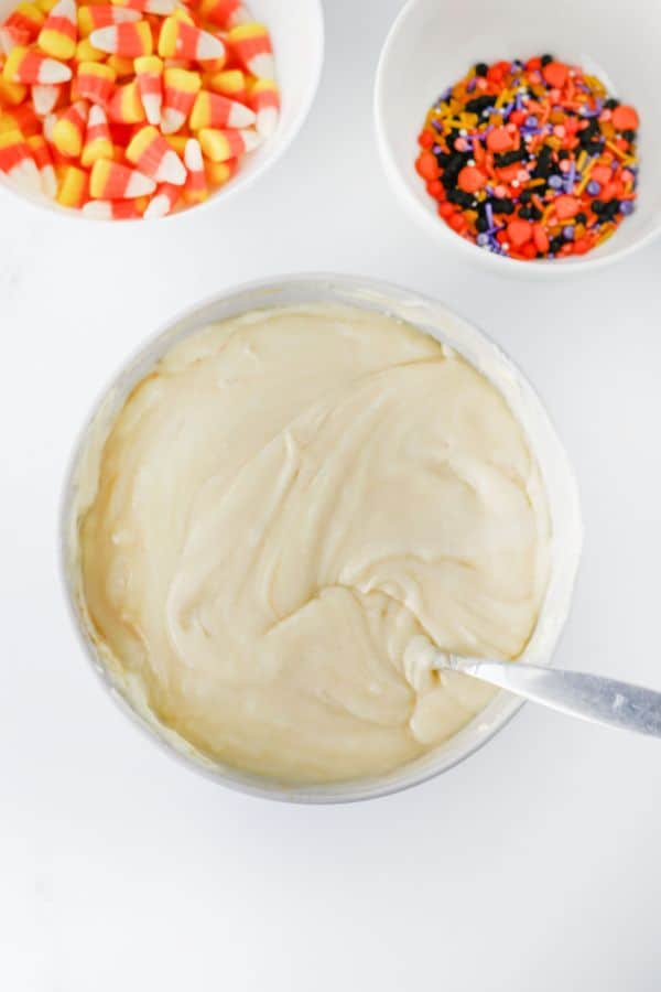 condensed milk and melted white chocolate in bowl.