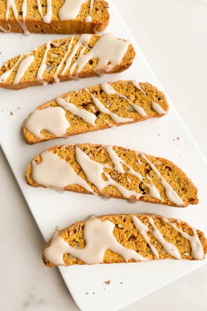 pieces of pumpkin biscotti on plate.