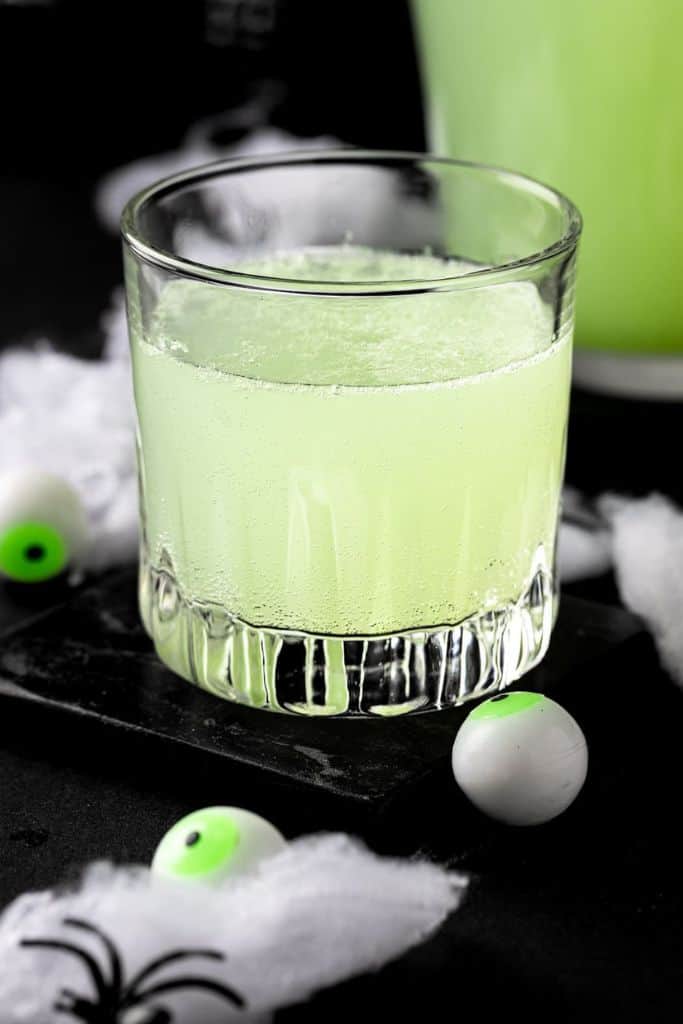 green halloween punch in glass.