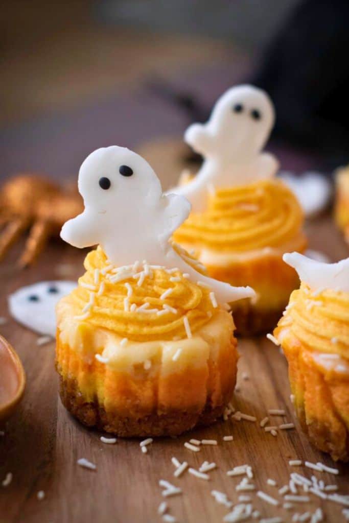 mini cheesecakes with ghost candy.