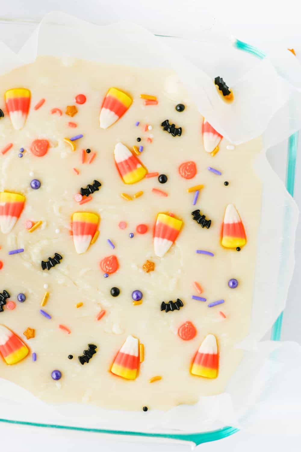 white fudge with halloween treats in dish.