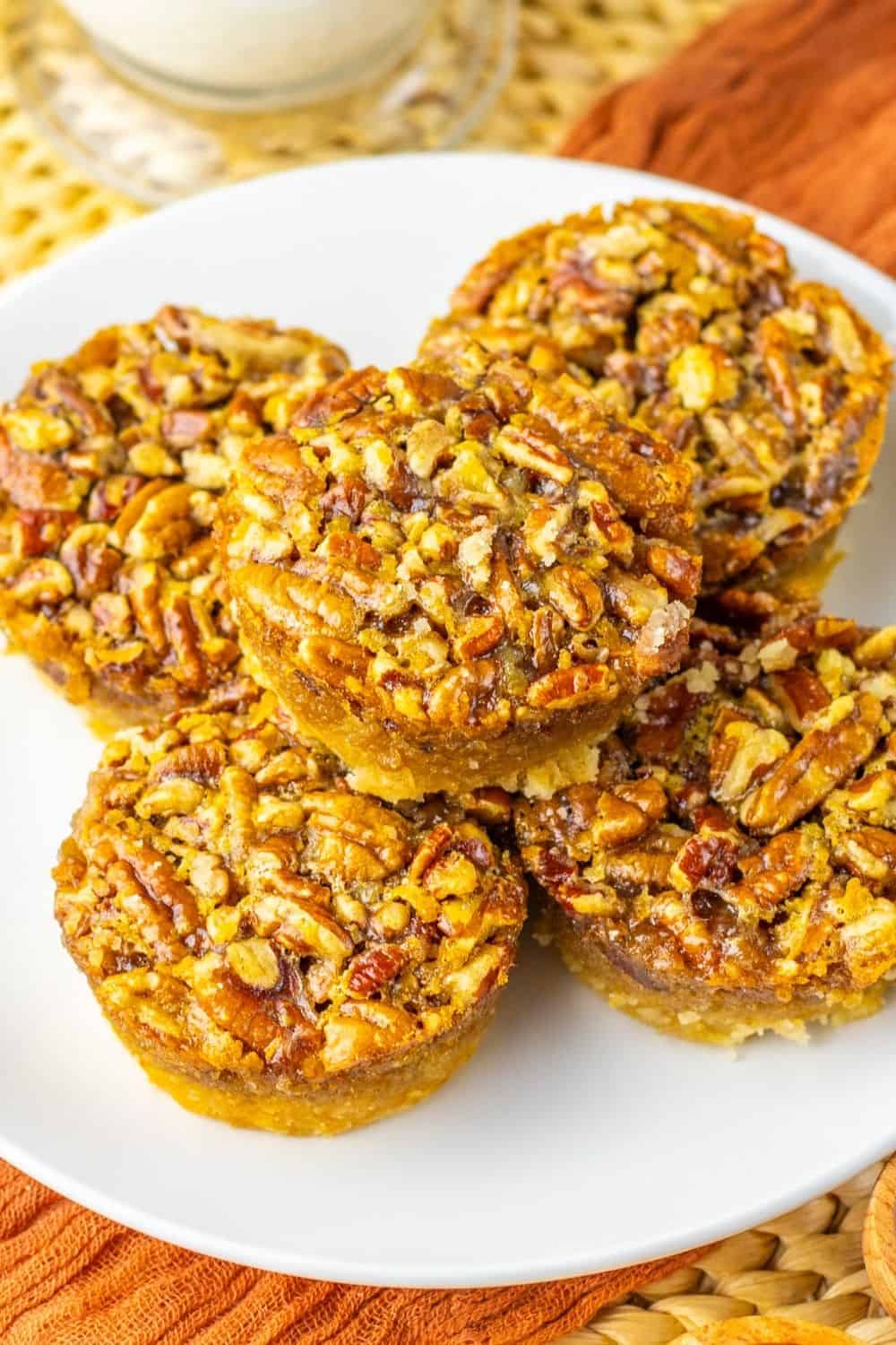 pecan mini pies on plate.