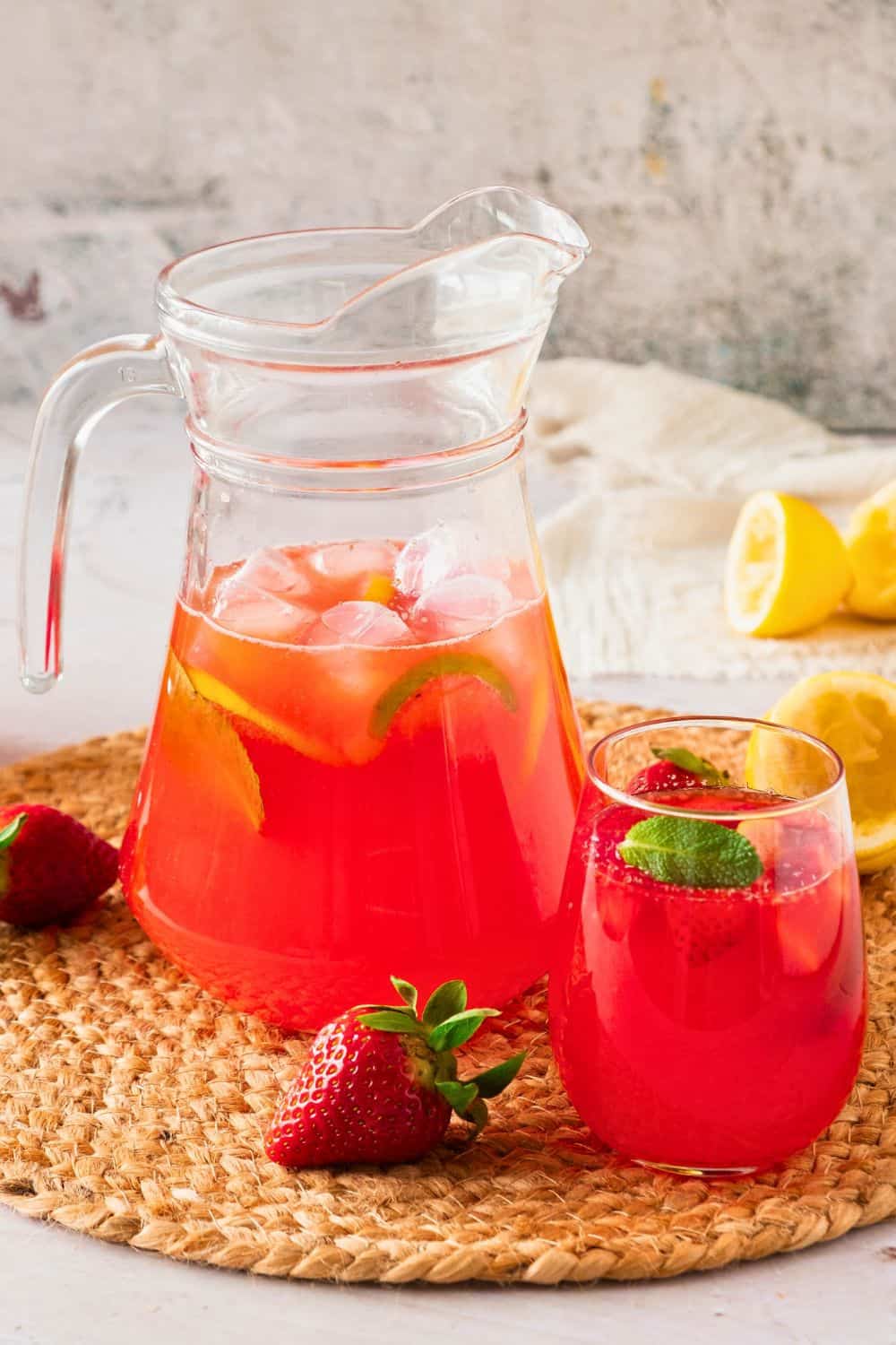 Pitcher of homemade strawberry lemonade.