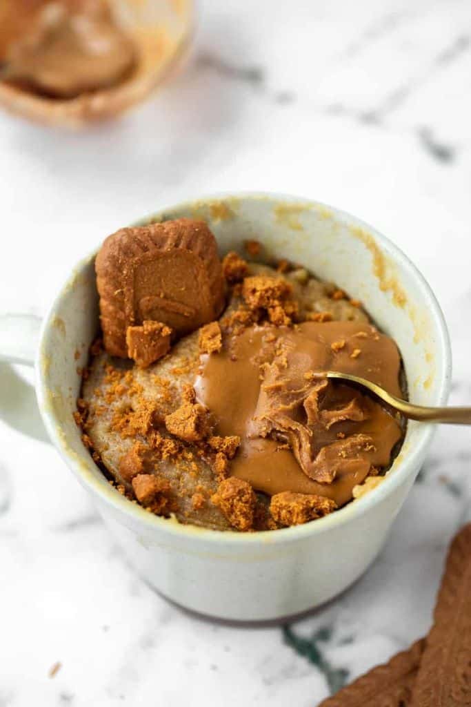biscoff flavored mug cake in cup.