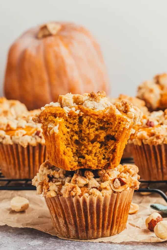 stack of pumpkin hazelnut crumble muffins.