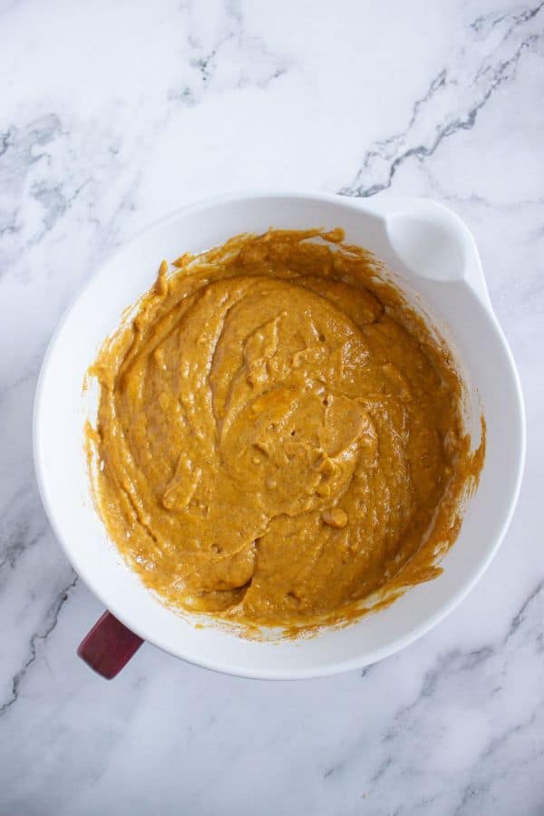 pumpkin muffins batter in bowl.