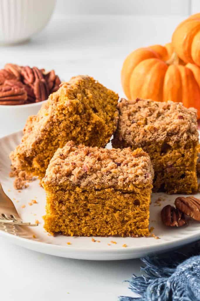 pieces of pumpkin crumb cake on plate.