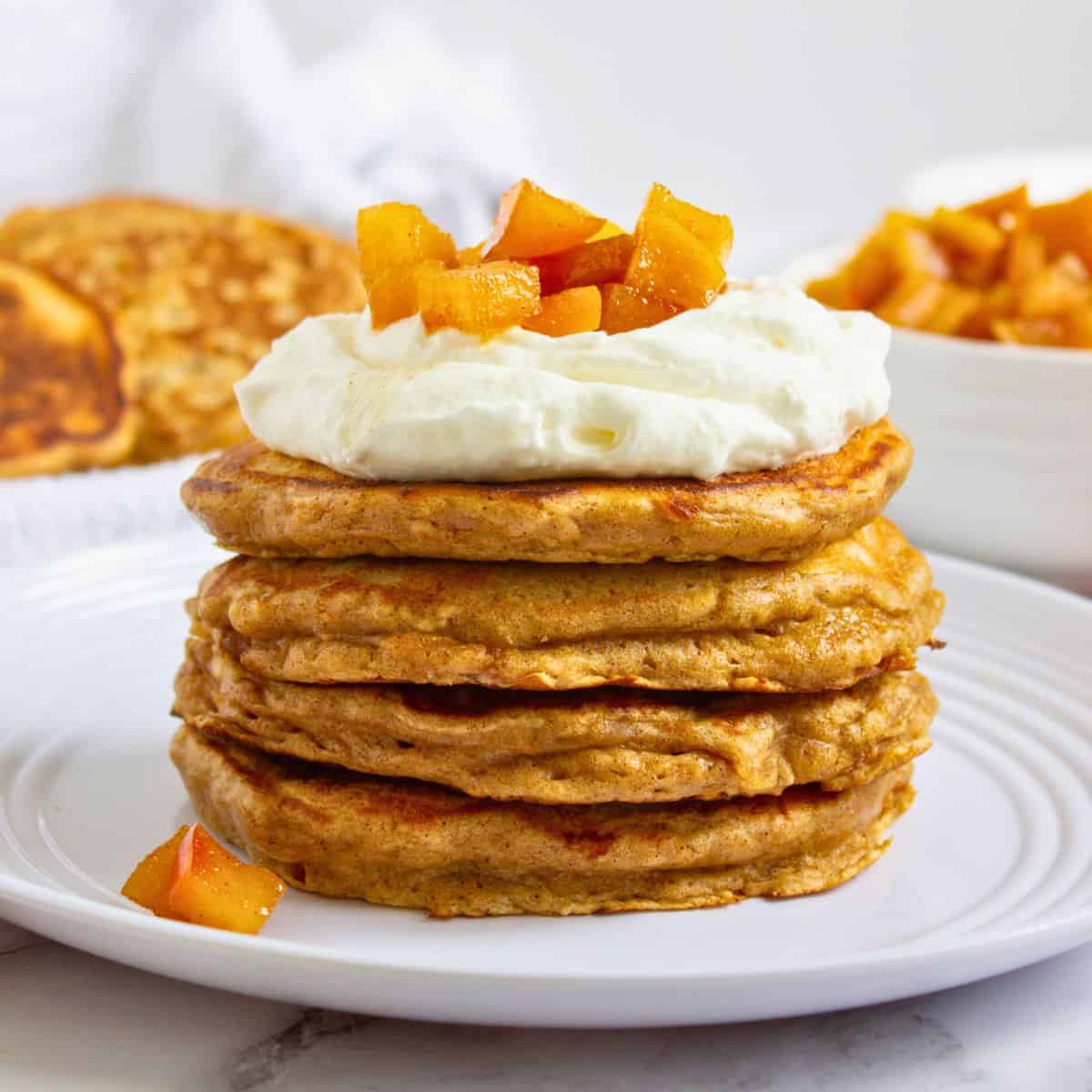 apple buttermilk pancakes with yogurt and apple compote.