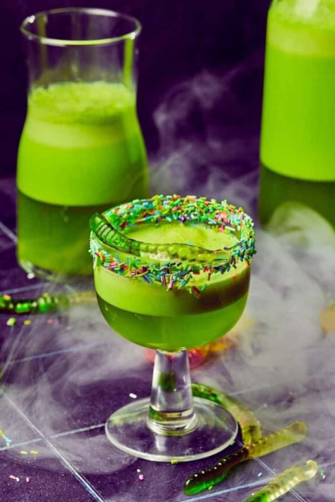 green halloween party punch in goblet.