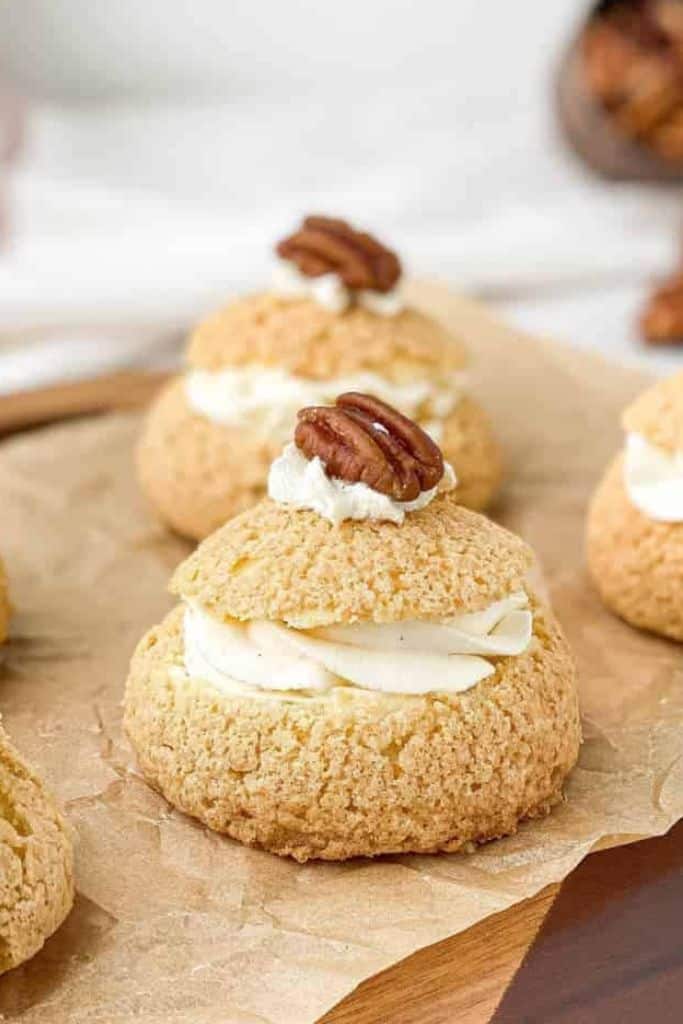individual pecan cream puffs with pecan pie filling.