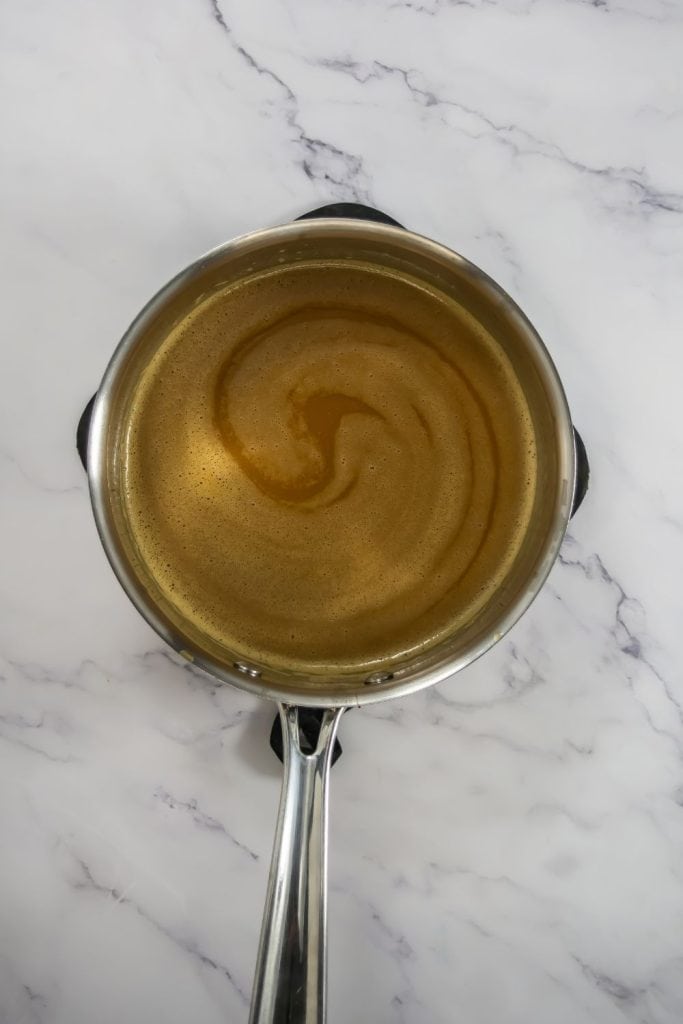 melted butter and molasses in saucepan.