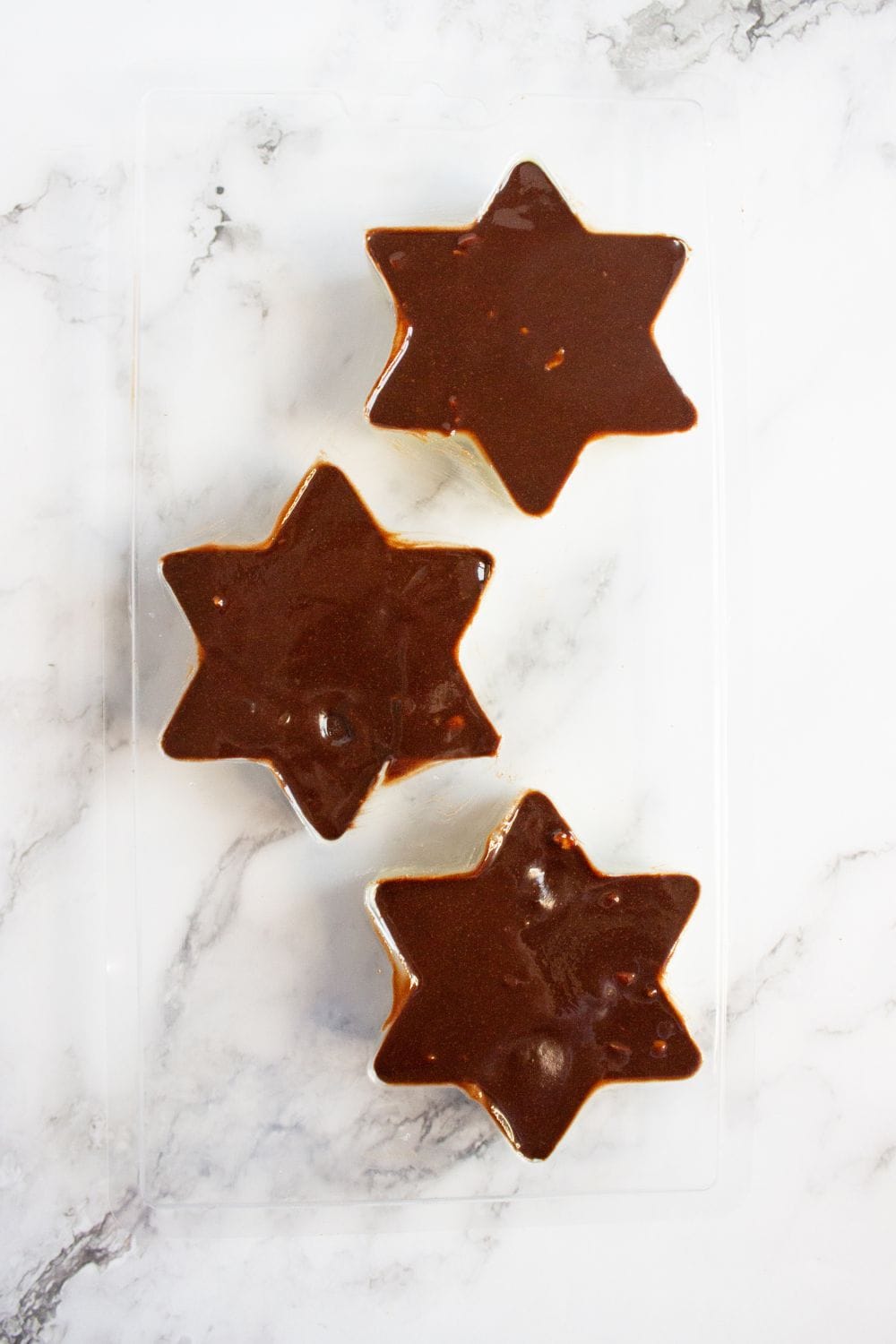 chocolate mixture poured into star shaped molds.