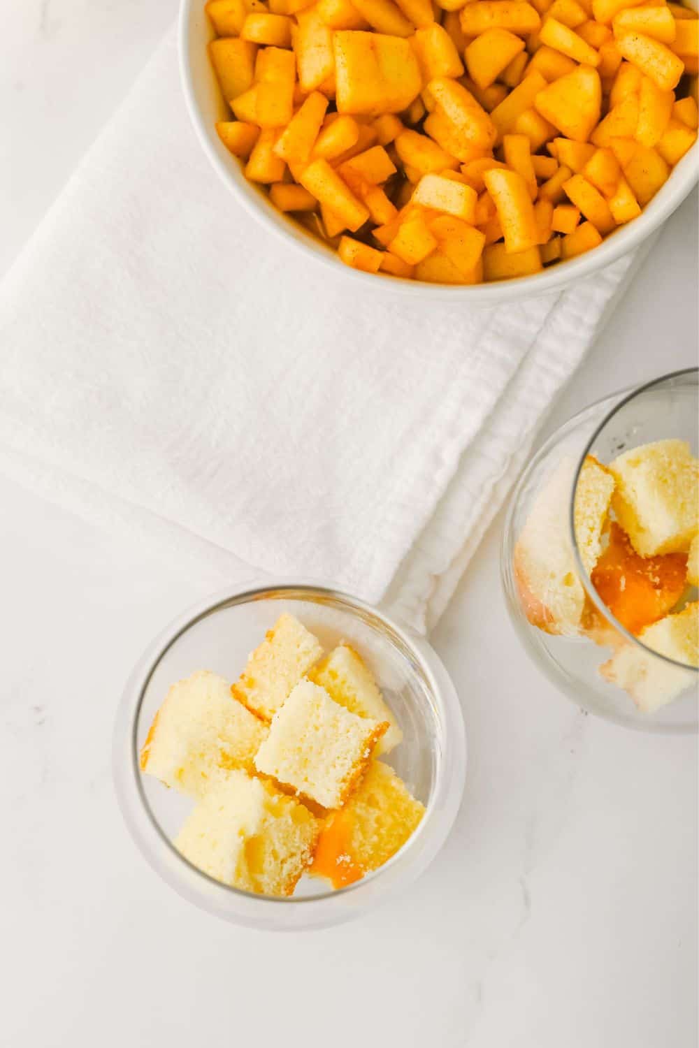 diced pound cake in a glass.