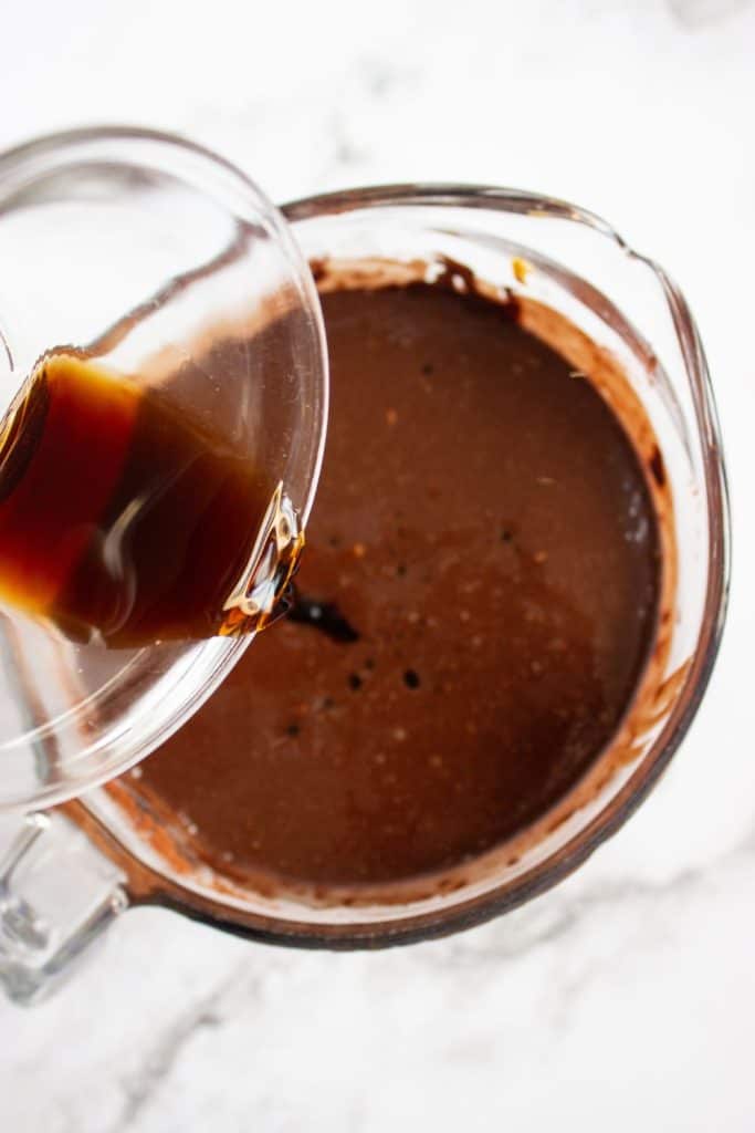 adding vanilla to chocolate fudge mixture.
