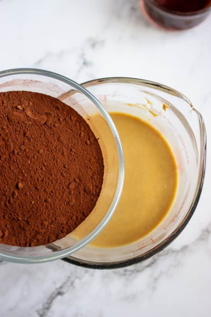 adding cocoa to coconut fudge mixture.