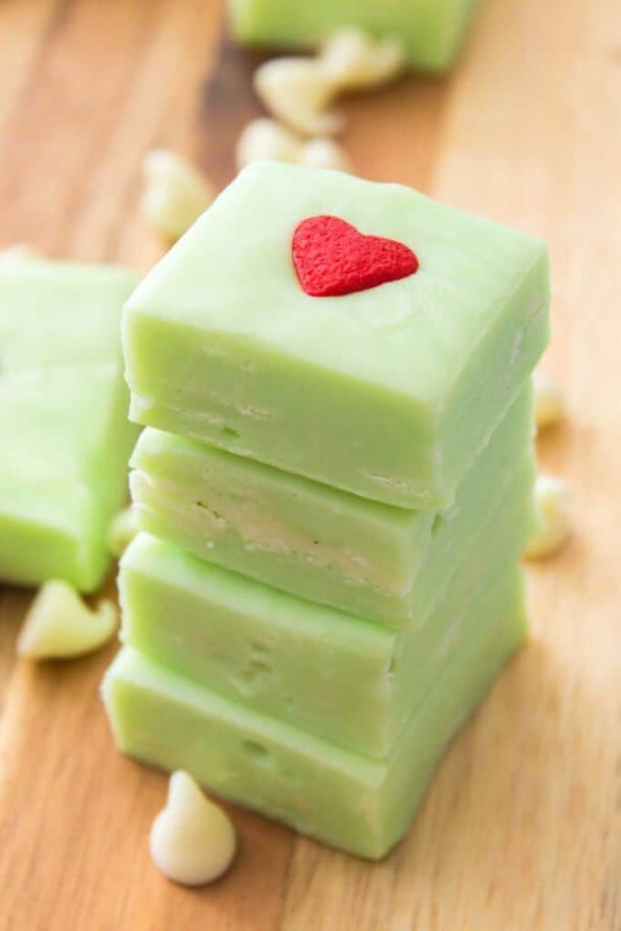 stack of grinch fudge pieces with red love heart.