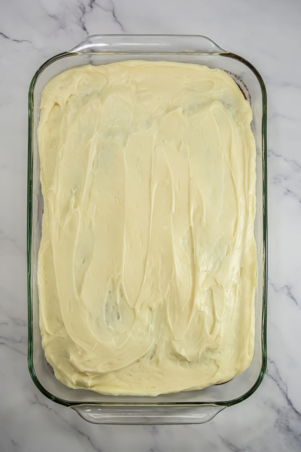 frosted ginger cake in pan.