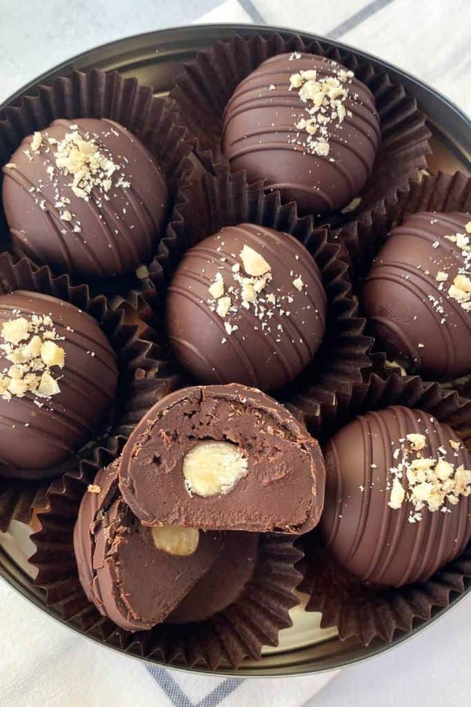 hazelnut espresso truffles in christmas gift tin.