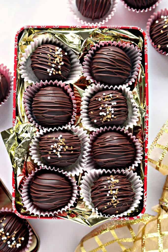 marzipan chocolates in holiday gift tin.