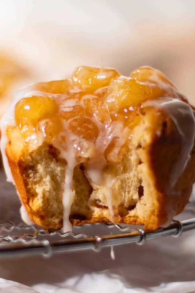 bite size cinnamon roll apple pie on rack.